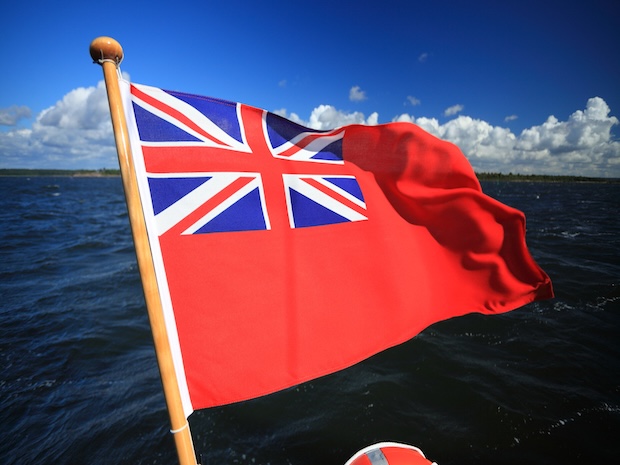 Red ensign flag with the water behind